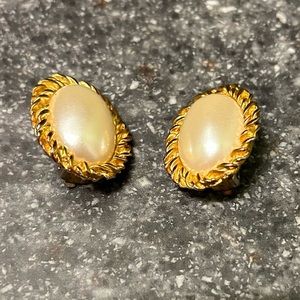 Women’s pearl-like earrings